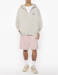 Oversize tracksuit shorts with badge - Pink Clay