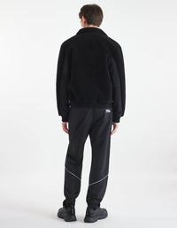 Back pocket trousers with badge - Black