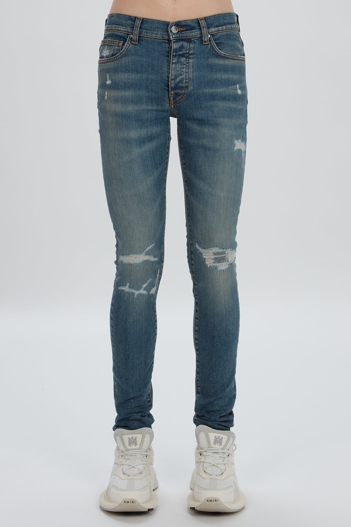 FRACTURED SKINNY JEAN