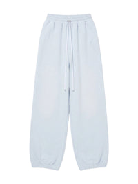 STACKED AMIRI BAGGY SWEATPANT
