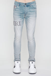 AMIRI SNAKE LOGO SKINNY JEAN