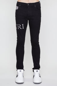 AMIRI SNAKE LOGO SKINNY JEAN