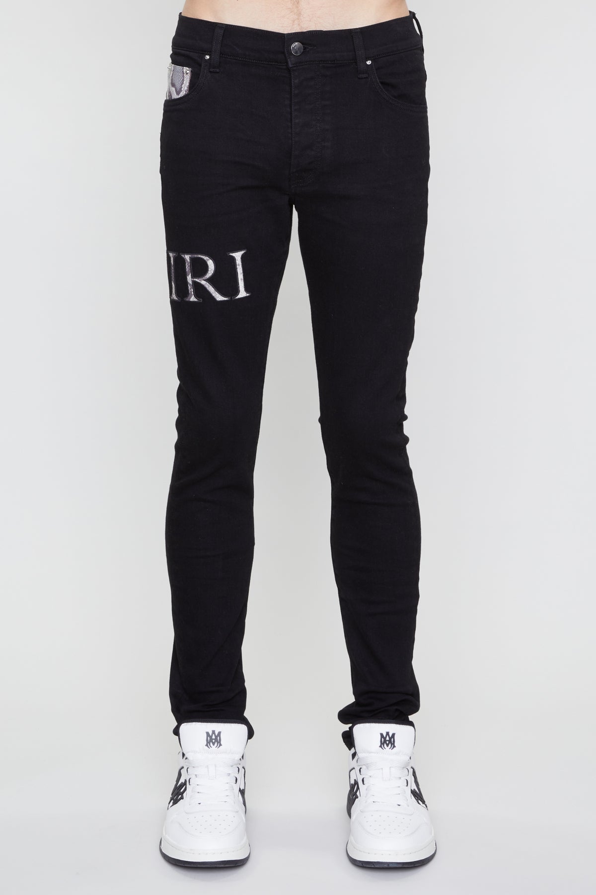 AMIRI SNAKE LOGO SKINNY JEAN