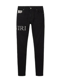 AMIRI SNAKE LOGO SKINNY JEAN