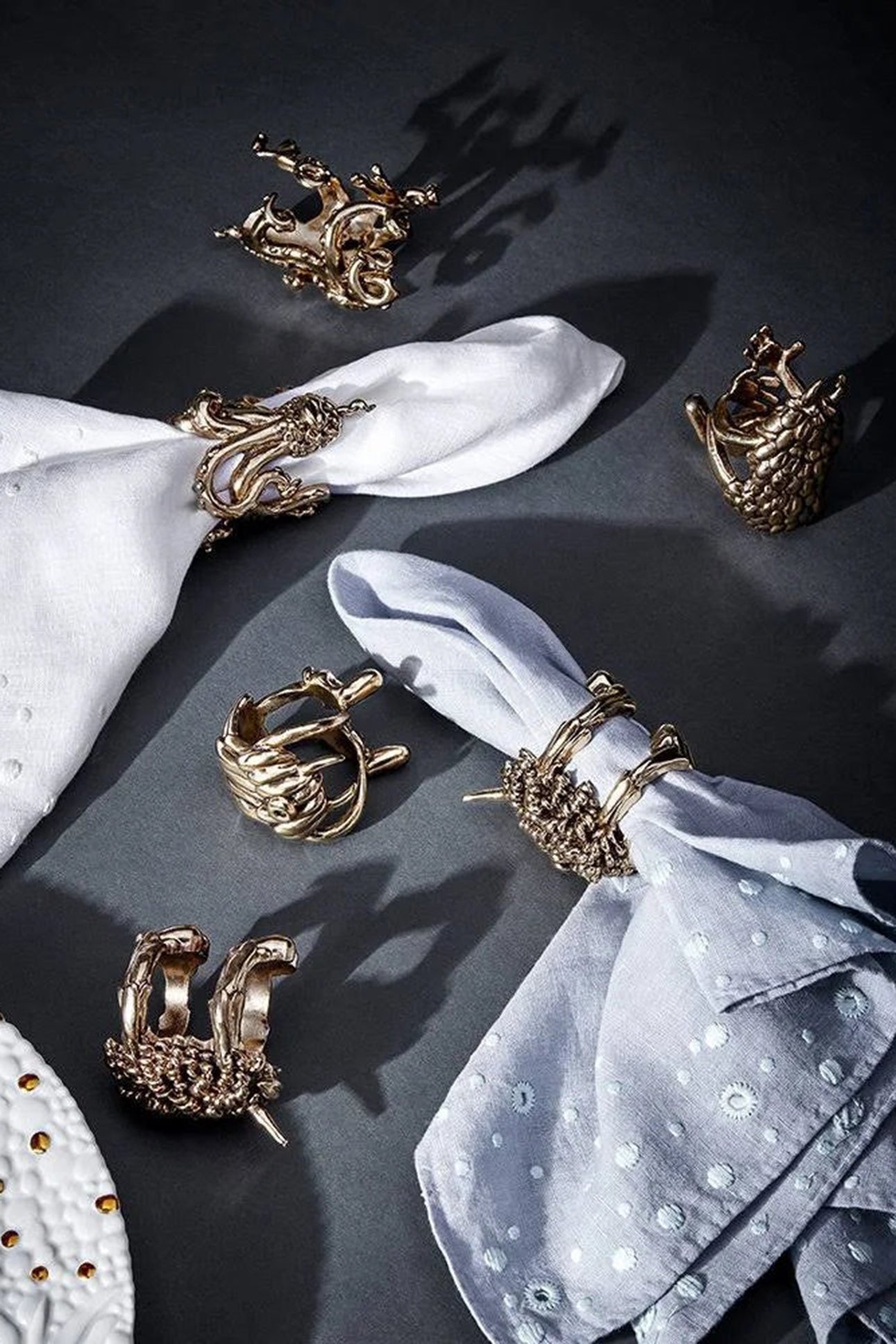 Set of 4 Haas Monster Ball brass napkin rings - Gold