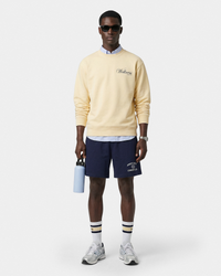 Short de sport Varsity Crest - Bleu marine/Blanc