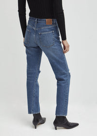 MID WAIST DENIM WITH RIPPED DETAILS